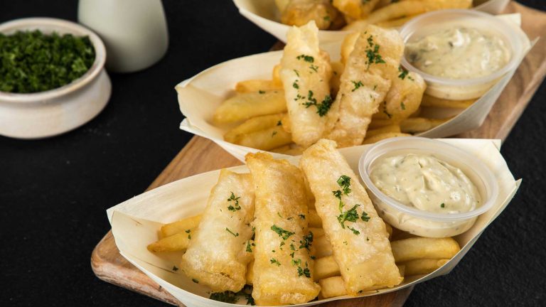 Image of the fish and chips dished up
