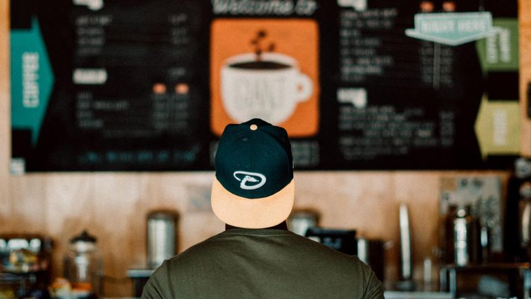 Image of man looking at a mirror
